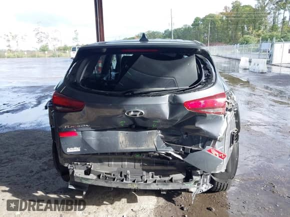 2019 Hyundai Tucson SE z VIN KM8J23A45KU910414, wystawiony jako IAAI lot #43338449 z przebiegiem 141 386 mil mil oraz . Historia ofert i sprzedaży dostępna na DreamBid. Obrazek 16.