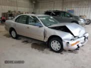 ✅ 1994 Toyota Camry DLX • VIN: 4T1SK11EXRU350093 • Lot: 51749395. Wystawiony na Copart z przebiegiem 249 743 mil. Bezpłatny archiwum sprzedaży aukcyjnych z USA i szczegółowy raport historii pojazdu na DreamBid. Zdjęcie 4.