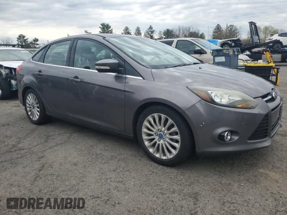 ✅ 2012 Ford Focus Titanium • VIN: 1FAHP3J23CL144893 • Lot: 52131055. Listed on Copart with 113,267 mi. Free auction sales archive from the USA and detailed vehicle history report at DreamBid. Image 4.