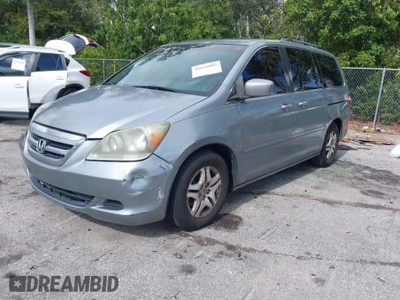 ✅ 2006 Honda Odyssey EX-L • VIN: 5FNRL38666B053689 • Lot: 43836082. Listed on IAAI with 171,596 mi. Free auction sales archive from the USA and detailed vehicle history report at DreamBid. Image 2.