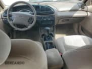 ✅ 1998 Ford Contour LX • VIN: 1FAFP66LXWK197384 • Lot: 51519385. Listed on Copart with 56,958 mi. Free auction sales archive from the USA and detailed vehicle history report at DreamBid. Image 8.