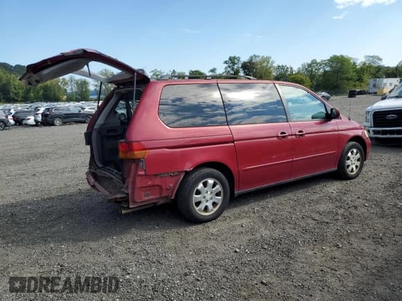 ✅ 2002 Honda Odyssey EX-L • VIN: 2HKRL18972H573670 • Lot: 80297685. Listed on Copart with 186,167 mi. Free auction sales archive from the USA and detailed vehicle history report at DreamBid. Image 3.