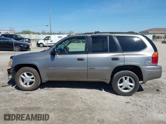 ✅ 2006 GMC Envoy SLE • VIN: 1GKDT13S662122195 • Lot: 42228257. Listed on IAAI with 177,365 mi. Free auction sales archive from the USA and detailed vehicle history report at DreamBid. Image 15.