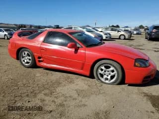 ✅ 1999 Mitsubishi 3000GT • VIN: JA3AM44H2XY001614 • Lot: 77580444. Wystawiony na Copart z przebiegiem 128 948 mil. Bezpłatny archiwum sprzedaży aukcyjnych z USA i szczegółowy raport historii pojazdu na DreamBid. Zdjęcie 4.