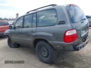 ✅ 2001 Lexus LX 470 • VIN: JTJHT00WX13509489 • Lot: 42227083. Listed on IAAI with 360,283 mi. Free auction sales archive from the USA and detailed vehicle history report at DreamBid. Image 3.