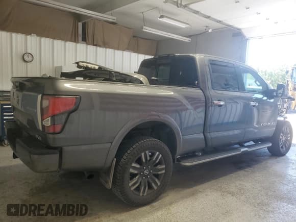 ✅ 2021 Nissan Titan Pro-4X • VIN: 1N6AA1FB0MN531043 • Лот: 68959695. Опубликован ранее на Copart с пробегом 74 035 миль. Бесплатный доступ к архиву аукционных продаж из США и подробный отчёт об истории автомобиля на DreamBid. Изображение 3.