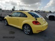 ✅ 2013 Volkswagen Beetle 2.5L w/Sun/Sound/Nav • VIN: 3VWJX7AT6DM681802 • Лот: 51285715. Опубликован ранее на Copart с пробегом 54 481 миль. Бесплатный доступ к архиву аукционных продаж из США и подробный отчёт об истории автомобиля на DreamBid. Изображение 2.