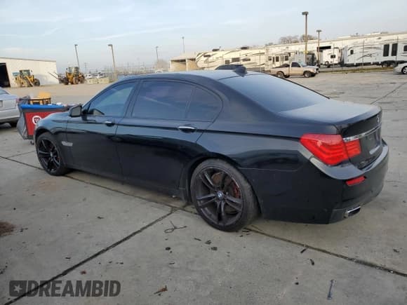 ✅ 2011 BMW 7 Series 750Li • VIN: WBAKB8C51BCY66264 • Lot: 85604624. Listed on Copart with 94,563 mi. Free auction sales archive from the USA and detailed vehicle history report at DreamBid. Image 2.