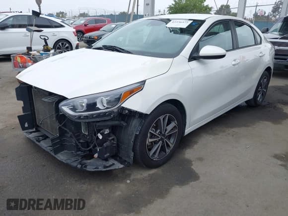 ✅ 2021 Kia Forte LXS • VIN: 3KPF24AD1ME375065 • Lot: 42356572. Listed on IAAI with 83,025 mi. Free auction sales archive from the USA and detailed vehicle history report at DreamBid. Image 2.