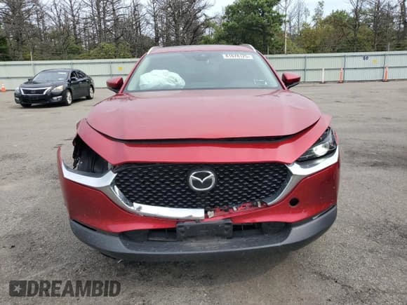 ✅ 2022 Mazda CX-30 S Carbon Edition • VIN: 3MVDMBCL3NM412097 • Лот: 81678125. Опубликован ранее на Copart с пробегом 33 173 миль. Бесплатный доступ к архиву аукционных продаж из США и подробный отчёт об истории автомобиля на DreamBid. Изображение 5.