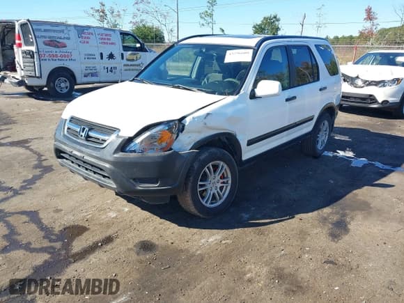 ✅ 2003 Honda CR-V EX • VIN: JHLRD78893C027184 • Lot: 43596608. Listed on IAAI with 213,692 mi. Free auction sales archive from the USA and detailed vehicle history report at DreamBid. Image 17.