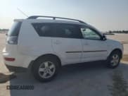 ✅ 2008 Mitsubishi Outlander ES • VIN: JA4LT21W38Z004760 • Lot: 59274325. Listed on Copart with 102,060 mi. Free auction sales archive from the USA and detailed vehicle history report at DreamBid. Image 3.