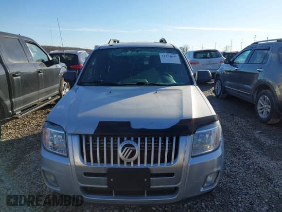 2010 Mercury Mariner z VIN 4M2CN8B73AKJ15604, wystawiony jako IAAI lot #41454647 z przebiegiem 170 761 mil mil oraz . Historia ofert i sprzedaży dostępna na DreamBid. Obrazek 12.