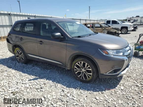 2018 Mitsubishi Outlander ES with VIN JA4AZ3A39JZ027175, listed as a Copart auction lot 70573725 with 197,576 mi miles and Salvage title. Bid and sale history available at DreamBid. Image 4.