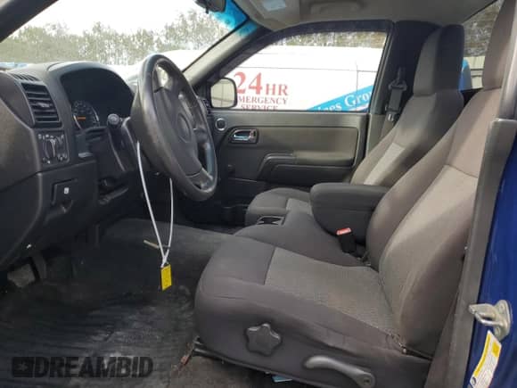 2012 Chevrolet Colorado Work Truck with VIN 1GCGTBFE3C8125018, listed as a Copart auction lot 90024745 with 156,864 mi miles and Salvage title. Bid and sale history available at DreamBid. Image 7.