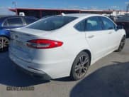 ✅ 2020 Ford Fusion Titanium • VIN: 3FA6P0D90LR173610 • Lot: 43705523. Wystawiony na IAAI z przebiegiem 158 452 mil. Bezpłatny archiwum sprzedaży aukcyjnych z USA i szczegółowy raport historii pojazdu na DreamBid. Zdjęcie 4.