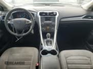 ✅ 2016 Ford Fusion S Hybrid • VIN: 3FA6P0UU7GR130599 • Lot: 86799175. Wystawiony na Copart z przebiegiem 128 866 mil. Bezpłatny archiwum sprzedaży aukcyjnych z USA i szczegółowy raport historii pojazdu na DreamBid. Zdjęcie 8.