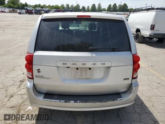 2012 Dodge Grand Caravan SXT z VIN 2C4RDGCG9CR178979, wystawiony jako Copart lot #70486195 z przebiegiem 276 546 mil mil oraz Szkoda całkowita • Salvage title. Historia ofert i sprzedaży dostępna na DreamBid. Obrazek 6.