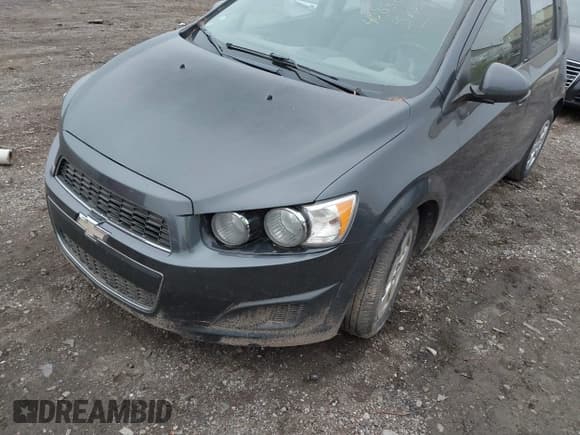 ✅ 2013 Chevrolet Sonic LS • VIN: 1G1JA6SH0D4171460 • Lot: 40888935. Listed on IAAI with 134,129 mi. Free auction sales archive from the USA and detailed vehicle history report at DreamBid. Image 2.
