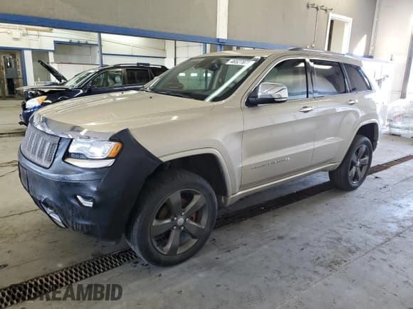 ✅ 2015 Jeep Grand Cherokee Overland • VIN: 1C4RJFCG7FC673181 • Lot: 46527875. Listed on Copart with 124,503 mi. Free auction sales archive from the USA and detailed vehicle history report at DreamBid. Image 1.