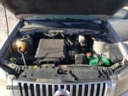 ✅ 2011 Mercury Mariner • VIN: 4M2CN9BG0BKJ00565 • Lot: 75045024. Listed on Copart with 125,735 mi. Free auction sales archive from the USA and detailed vehicle history report at DreamBid. Image 14.