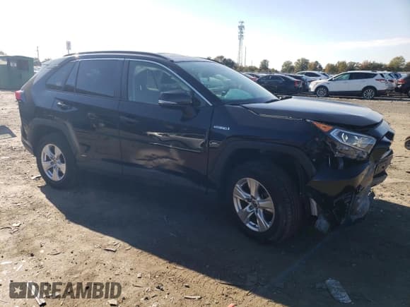 ✅ 2021 Toyota RAV4 Hybrid XLE • VIN: JTMRWRFV2MD122015 • Lot: 82564095. Listed on Copart with 87,700 mi. Free auction sales archive from the USA and detailed vehicle history report at DreamBid. Image 4.