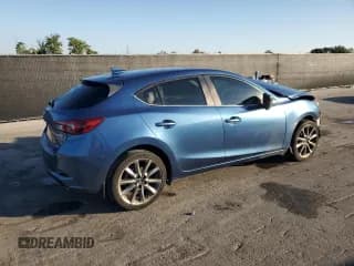 ✅ 2018 Mazda 3 Grand Touring • VIN: 3MZBN1M31JM173154 • Lot: 93317105. Wystawiony na Copart z przebiegiem 80 658 mil. Bezpłatny archiwum sprzedaży aukcyjnych z USA i szczegółowy raport historii pojazdu na DreamBid. Zdjęcie 3.