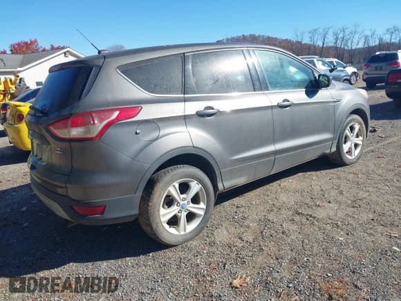 ✅ 2013 Ford Escape SE • VIN: 1FMCU9GX6DUB80085 • Lot: 43676828. Listed on IAAI with 146,765 mi. Free auction sales archive from the USA and detailed vehicle history report at DreamBid. Image 4.