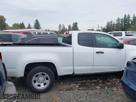 2021 Chevrolet Colorado 2WD Work Truck z VIN 1GCHSBEA3M1168998, wystawiony jako IAAI lot #43495434 z przebiegiem 61 773 mil mil oraz . Historia ofert i sprzedaży dostępna na DreamBid. Obrazek 14.
