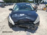 ✅ 2017 Ford Focus Titanium • VIN: 1FADP3J20HL307330 • Lot: 68597165. Wystawiony na Copart z przebiegiem 154 027 mil. Bezpłatny archiwum sprzedaży aukcyjnych z USA i szczegółowy raport historii pojazdu na DreamBid. Zdjęcie 5.