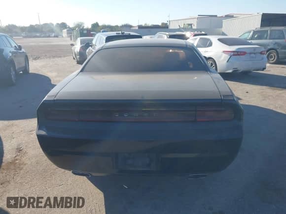 2014 Dodge Challenger SXT with VIN 2C3CDYAG5EH179879, listed as a IAAI auction lot 43410567 with 206,805 mi miles and . Bid and sale history available at DreamBid. Image 16.