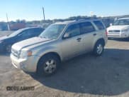 ✅ 2011 Ford Escape XLT • VIN: 1FMCU0DG7BKA31127 • Lot: 43387340. Listed on IAAI with 223,498 mi. Free auction sales archive from the USA and detailed vehicle history report at DreamBid. Image 2.