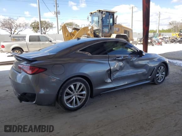 ✅ 2018 Infiniti Q60 Luxe • VIN: JN1EV7EK8JM342142 • Лот: 44695825. Опубликован ранее на Copart с пробегом 100 389 миль. Бесплатный доступ к архиву аукционных продаж из США и подробный отчёт об истории автомобиля на DreamBid. Изображение 3.