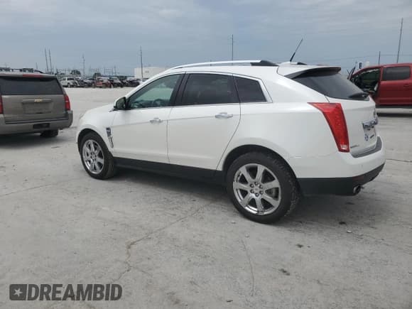 ✅ 2012 Cadillac SRX Premium Collection • VIN: 3GYFNFE30CS536228 • Lot: 80386415. Wystawiony na Copart z przebiegiem 203 284 mil. Bezpłatny archiwum sprzedaży aukcyjnych z USA i szczegółowy raport historii pojazdu na DreamBid. Zdjęcie 2.