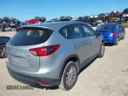 ✅ 2016 Mazda CX-5 Sport • VIN: JM3KE2BE9G0915168 • Lot: 41482749. Wystawiony na IAAI z przebiegiem 86 802 mil. Bezpłatny archiwum sprzedaży aukcyjnych z USA i szczegółowy raport historii pojazdu na DreamBid. Zdjęcie 4.