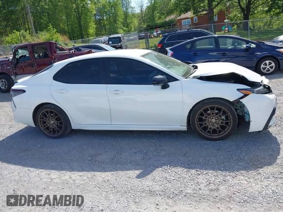 2023 Toyota Camry SE with VIN 4T1T11BK9PU079486, listed as a IAAI auction lot 42144138 with 49,598 mi miles and . Bid and sale history available at DreamBid. Image 13.