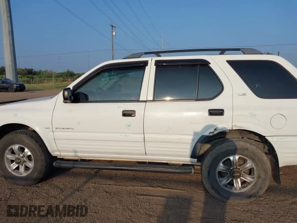 ✅ 2000 Isuzu Rodeo S • VIN: 4S2CK58W1Y4323057 • Lot: 43357739. Listed on IAAI with 147,414 mi. Free auction sales archive from the USA and detailed vehicle history report at DreamBid. Image 14.