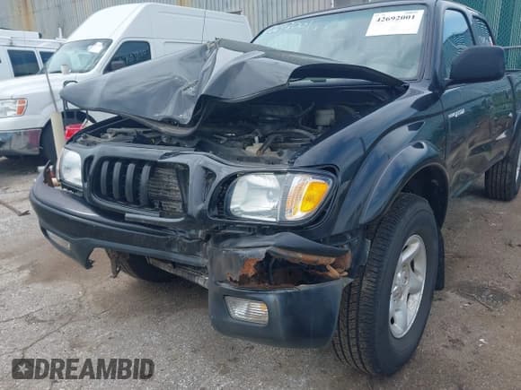✅ 2003 Toyota Tacoma • VIN: 5TEHN72N63Z301821 • Lot: 42692001. Listed on IAAI with 176,986 mi. Free auction sales archive from the USA and detailed vehicle history report at DreamBid. Image 6.