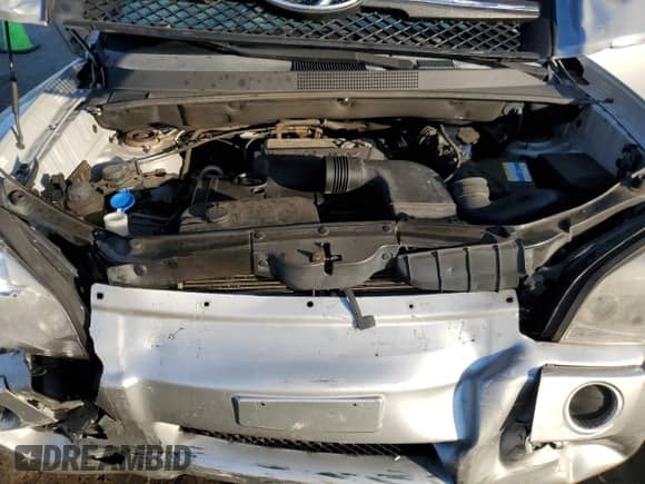 2008 Hyundai Tucson GLS z VIN KM8JM12B68U860966, wystawiony jako Copart lot #74446564 z przebiegiem 115 567 mil mil oraz Szkoda całkowita • Salvage title. Historia ofert i sprzedaży dostępna na DreamBid. Obrazek 14.