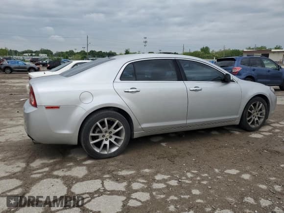 ✅ 2012 Chevrolet Malibu LTZ • VIN: 1G1ZG5E72CF117904 • Lot: 52998884. Listed on Copart with 138,605 mi. Free auction sales archive from the USA and detailed vehicle history report at DreamBid. Image 3.