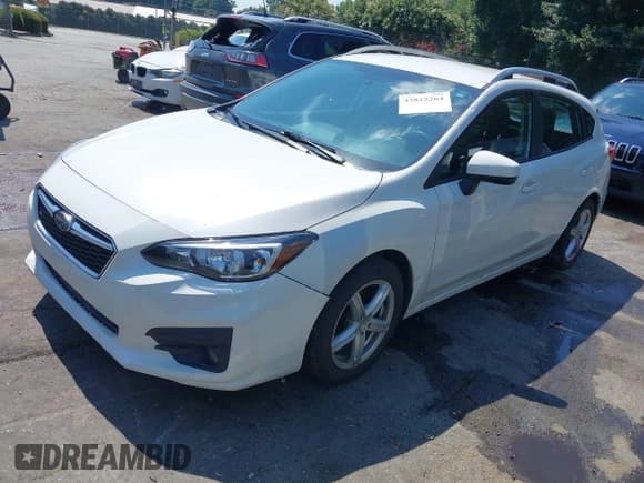 ✅ 2018 Subaru Impreza Premium • VIN: 4S3GTAD65J3728925 • Lot: 42812264. Listed on IAAI with 118,381 mi. Free auction sales archive from the USA and detailed vehicle history report at DreamBid. Image 2.