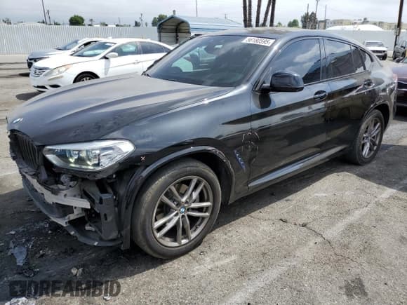 ✅ 2020 BMW X4 xDrive30i • VIN: 5UX2V1C0XL9B93562 • Lot: 56180595. Listed on Copart with 71,667 mi. Free auction sales archive from the USA and detailed vehicle history report at DreamBid. Image 1.
