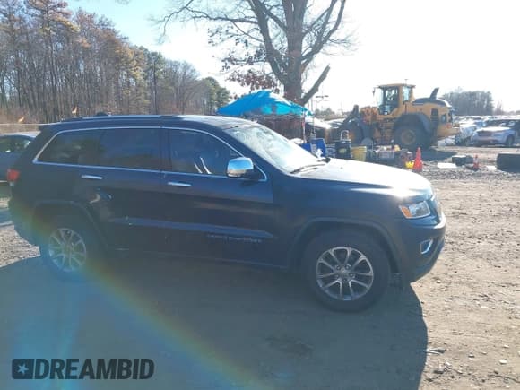 ✅ 2014 Jeep Grand Cherokee Limited • VIN: 1C4RJFBG0EC324217 • Lot: 43888563. Listed on IAAI with 158,725 mi. Free auction sales archive from the USA and detailed vehicle history report at DreamBid. Image 13.