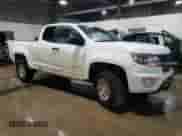 2018 Chevrolet Colorado 4WD Work Truck with VIN 1GCHTBEN7J1327601, listed as a Copart auction lot 58583635 with 168,696 mi miles and Salvage title. Bid and sale history available at DreamBid. Image 4.