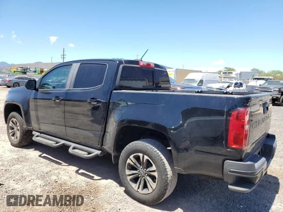 ✅ 2021 Chevrolet Colorado 4WD Z71 • VIN: 1GCGTDEN7M1128060 • Лот: 66130584. Опубликован ранее на Copart с пробегом 88 935 миль. Бесплатный доступ к архиву аукционных продаж из США и подробный отчёт об истории автомобиля на DreamBid. Изображение 2.