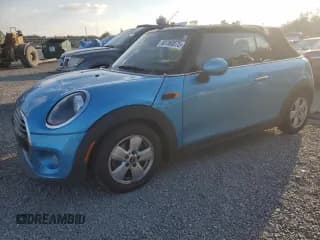 ✅ 2019 MINI Convertible Cooper • VIN: WMWWG5C51K3F79981 • Lot: 92760875. Listed on Copart with 128,420 mi. Free auction sales archive from the USA and detailed vehicle history report at DreamBid. Image 1.