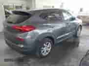 2019 Hyundai Tucson Value with VIN KM8J33A4XKU862390, listed as a IAAI auction lot 42769145 with 119,632 mi miles and . Bid and sale history available at DreamBid. Image 4.