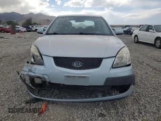 ✅ 2009 Kia Rio LX • VIN: KNADE223496469797 • Lot: 71005774. Wystawiony na Copart z przebiegiem 130 675 mil. Bezpłatny archiwum sprzedaży aukcyjnych z USA i szczegółowy raport historii pojazdu na DreamBid. Zdjęcie 5.