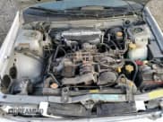 ✅ 2000 Subaru Impreza RS • VIN: JF1GC6755YH503214 • Lot: 77009144. Listed on Copart with 172,163 mi. Free auction sales archive from the USA and detailed vehicle history report at DreamBid. Image 12.