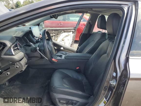 2021 Toyota Camry Hybrid XSE with VIN 4T1K31AK6MU024710, listed as a Copart auction lot 71182595 with 93,090 mi miles and Salvage title. Bid and sale history available at DreamBid. Image 7.